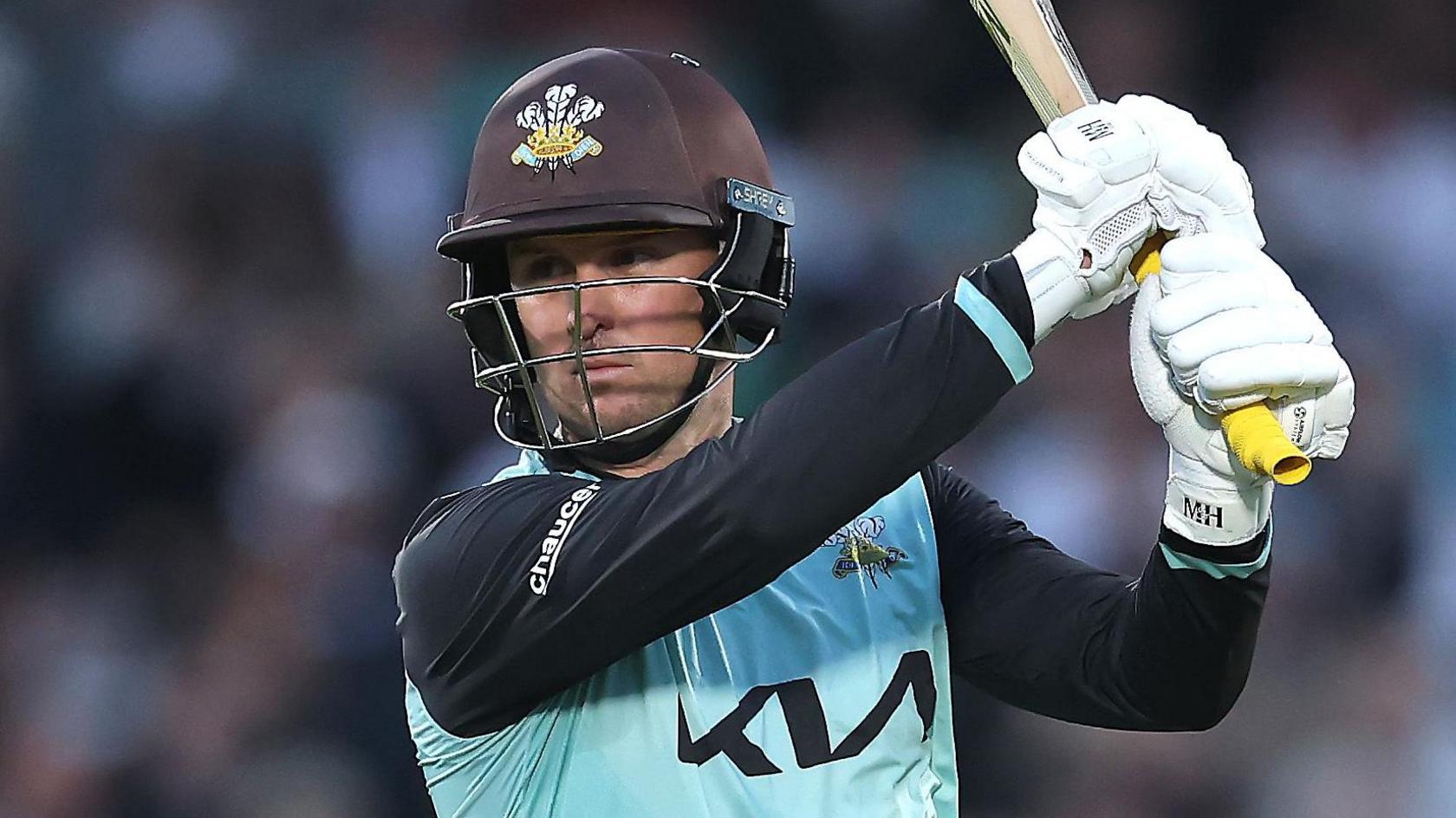 Jason Roy swishes his bat next to his left shoulder