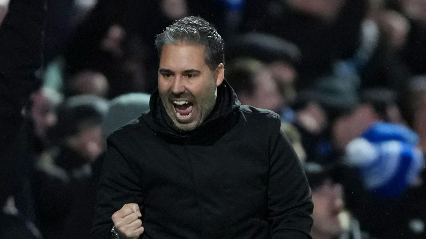 QPR's manager Marti Cifuentes celebrating with his fist clenched after seeing his side equalise.