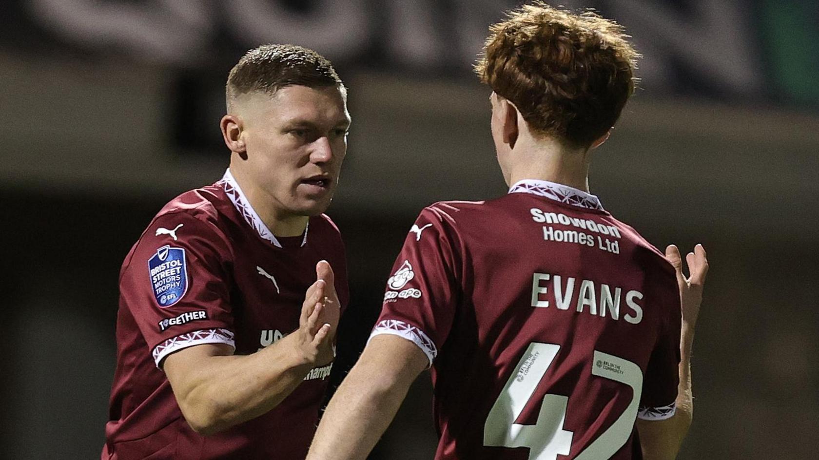 Martun Waghorn is congratulated after scoring for Northampton Town against Burton Albion