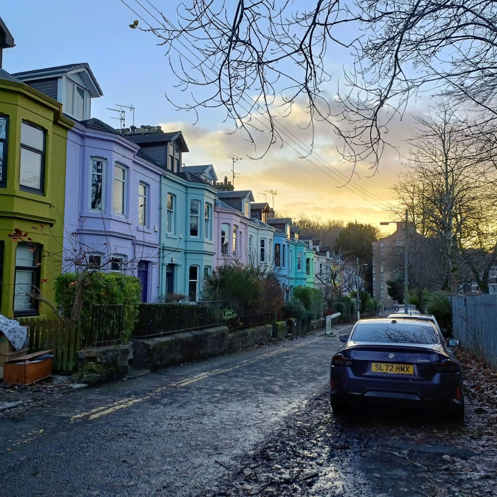 A Glasgow street with colourful houses