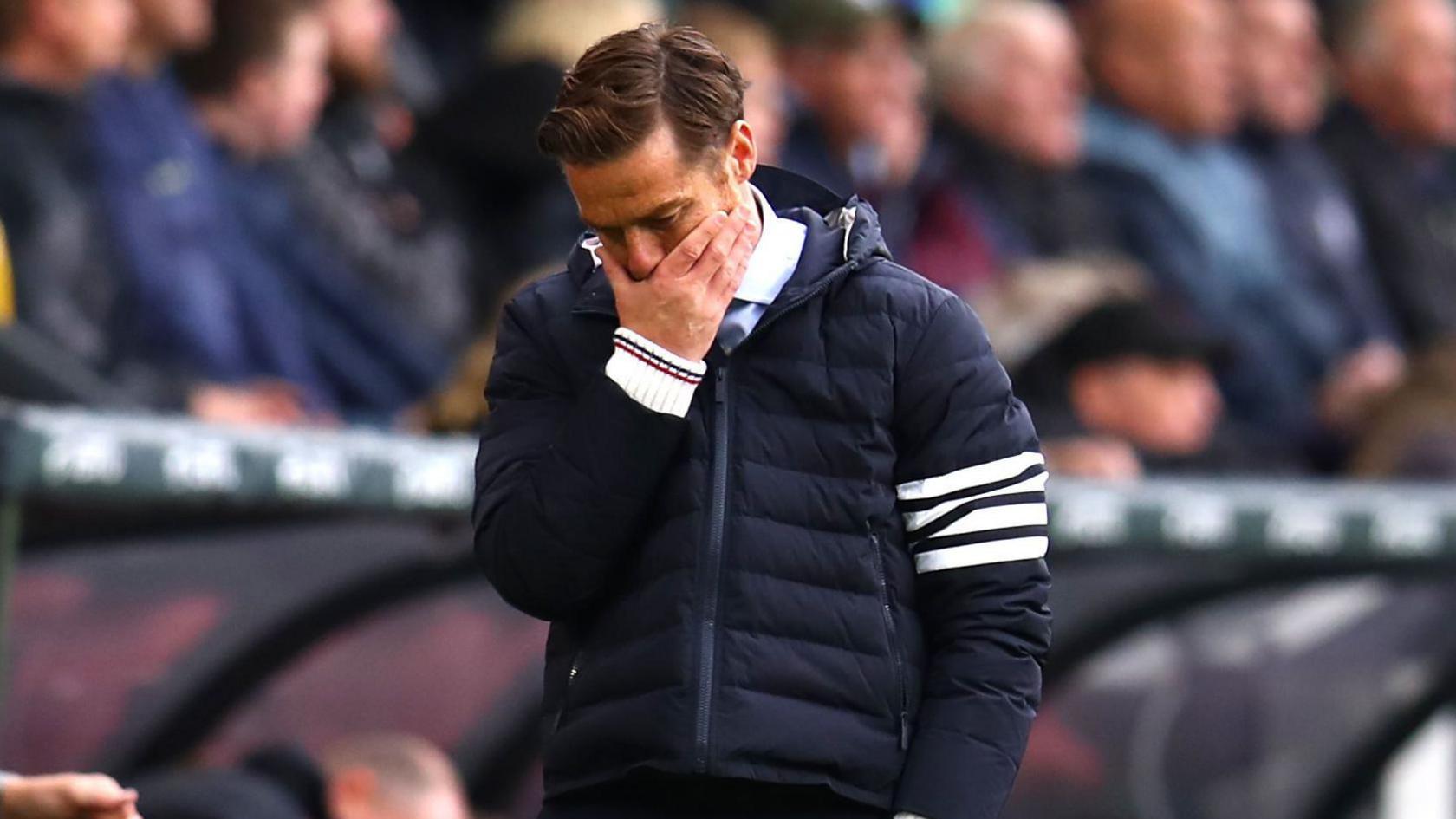 Burnley manager Scott Parker is devastated after Liverpool's stoppage time penalty condemns his side to defeat