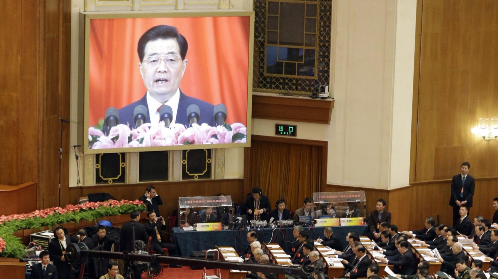 Hu Jintao is displayed on a screen during the opening session of the 18th Communist Party Congress held at the Great Hall of the People in Beijing, 08 Nov 2012