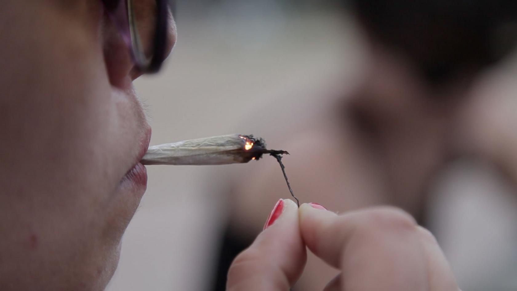 Man lights a joint in Uruguay