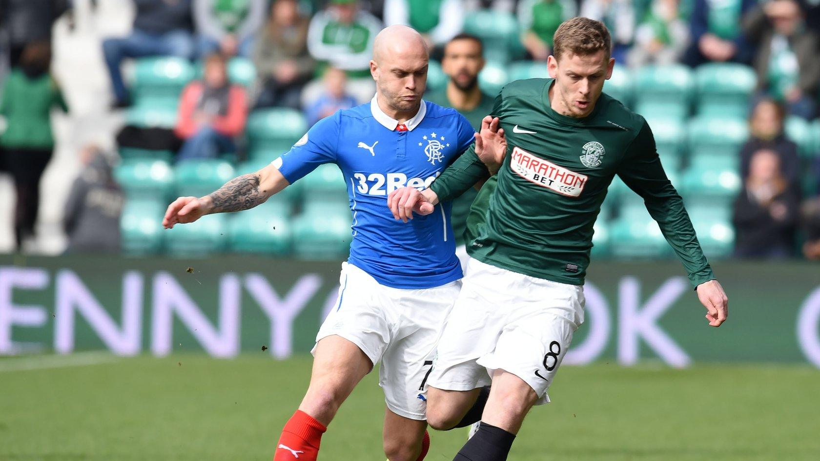 Nicky Law and Scott Robertson tussle for possession