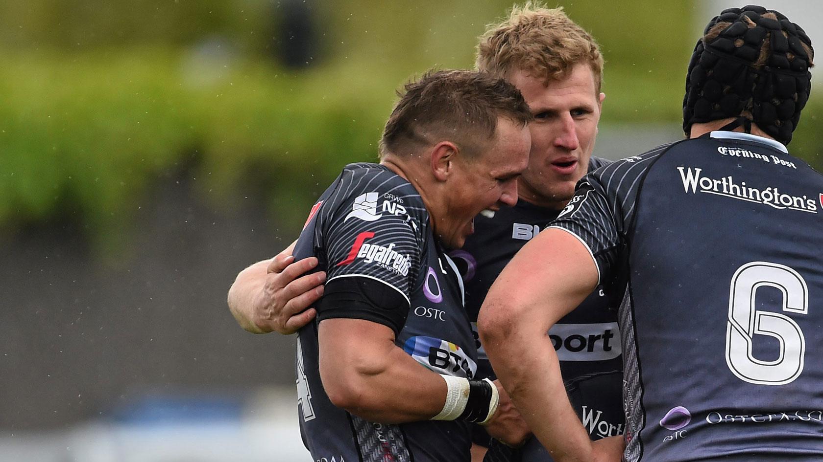 Ospreys celebrate a try