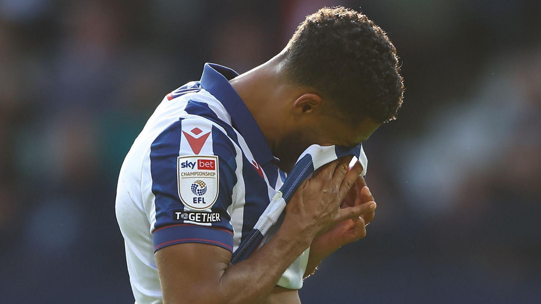 Darnell Furlong of West Bromwich Albion shows a look of dejection