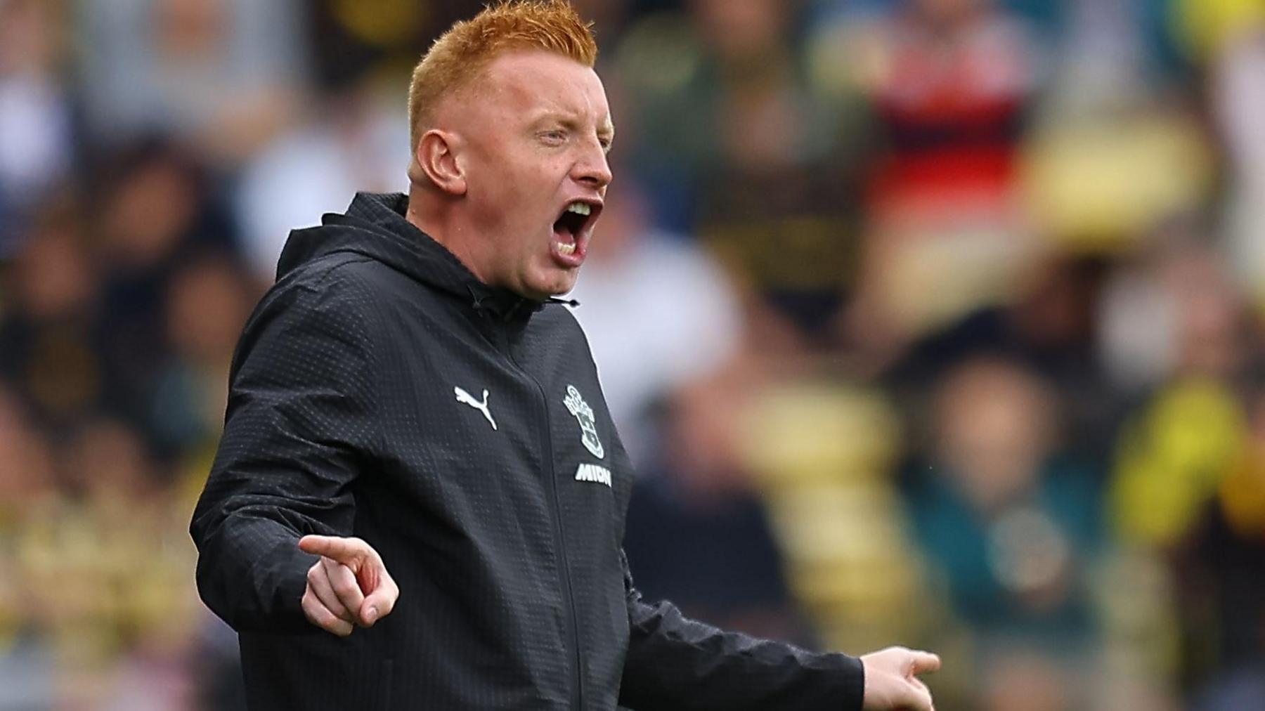 Will Still shouting instructions from the touchline