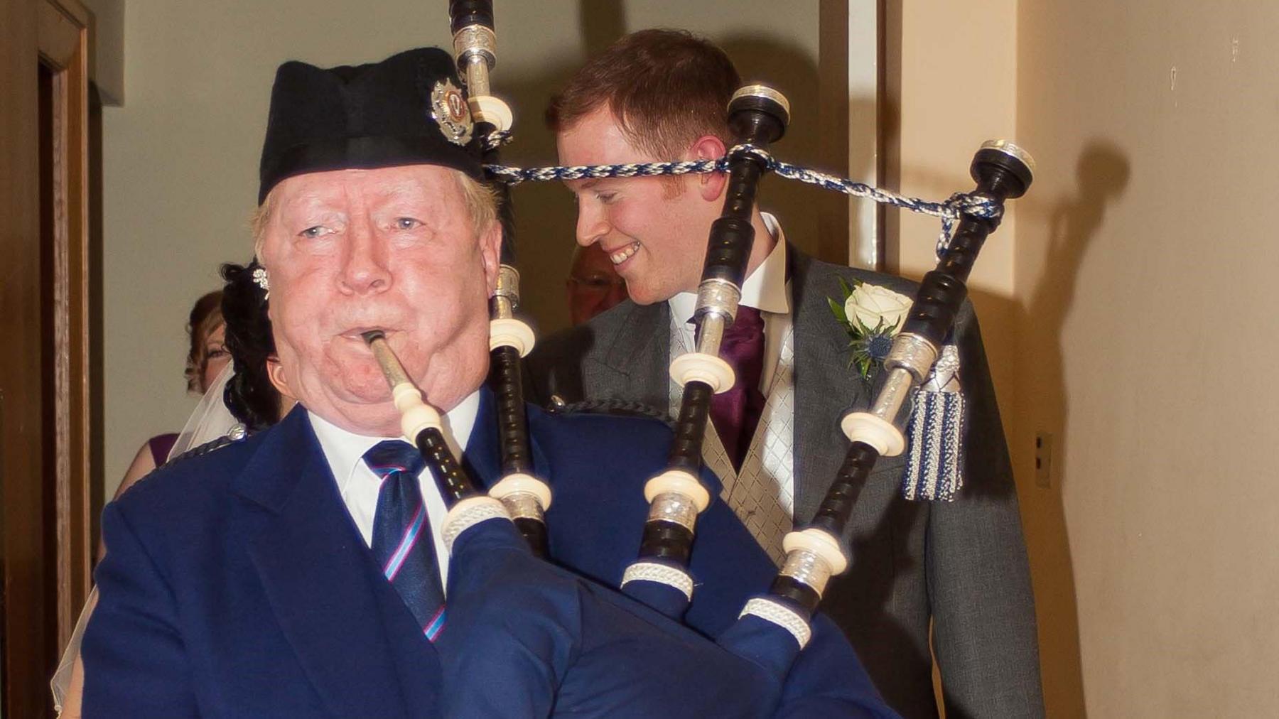 Jim Smith playing the bagpipes