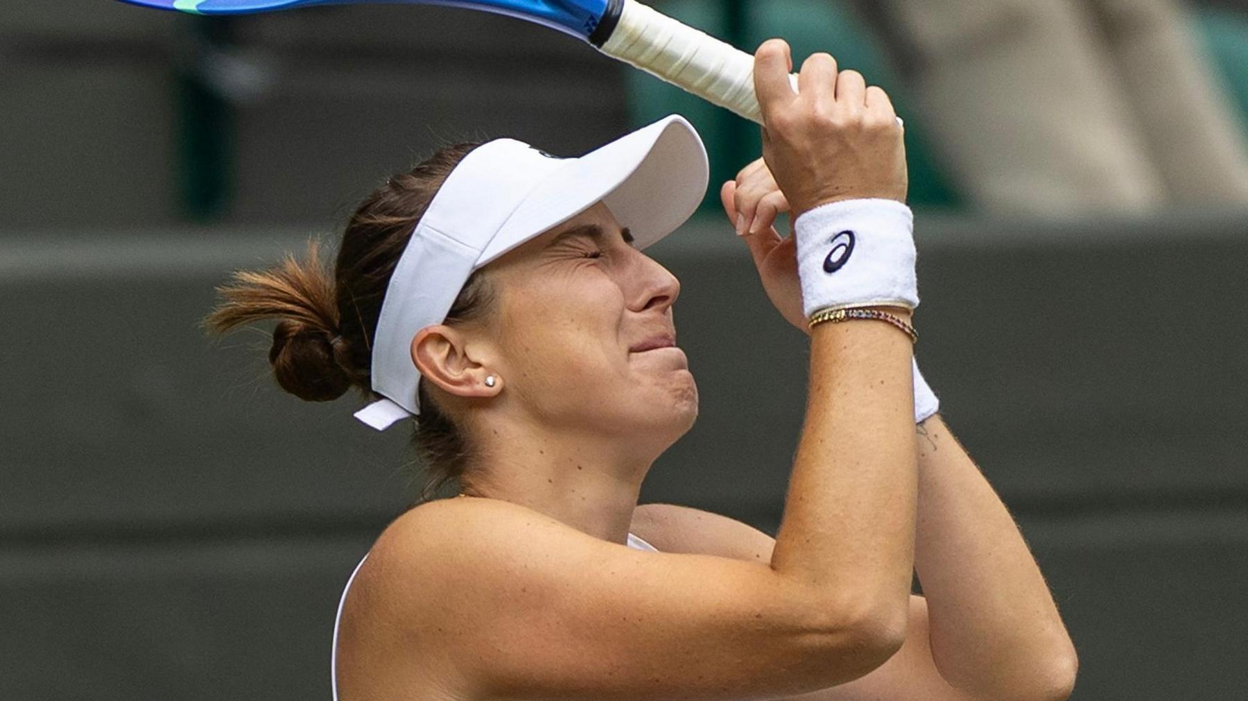 Belinda Bencic in tears after reaching the quarter-finals at Wimbledon