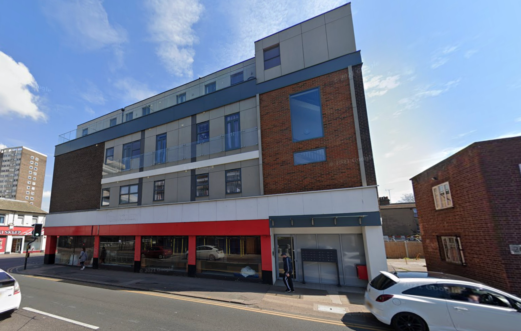 The building on the corner of Chichester Road and Southchurch Road in Southend-on-Sea. The bottom floor of the building is a restaurant with a white and red facade, and the upper floors are residential flats.