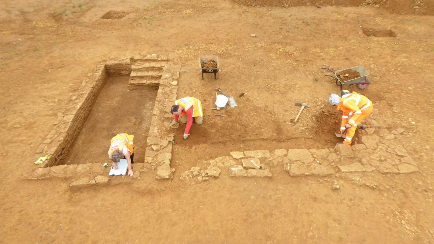 Archaeologists working on a Roman stone building