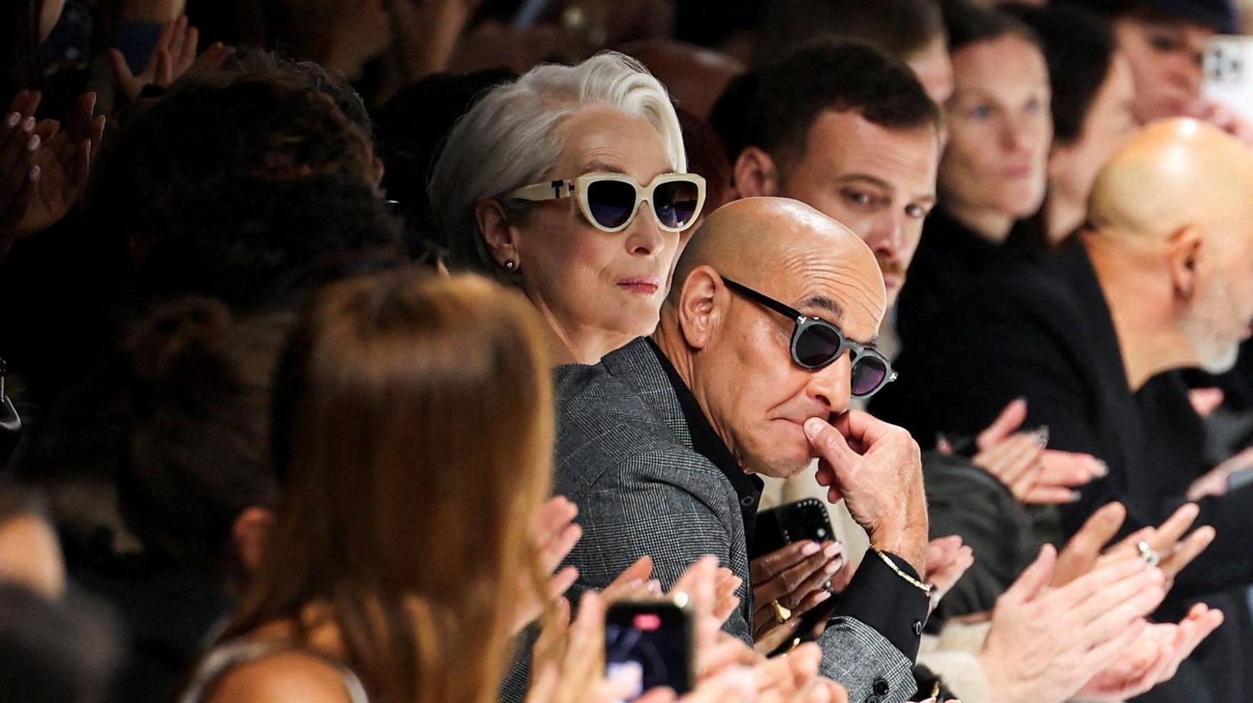Meryl Streep and Stanley Tucci look on at the end of the Dolce & Gabbana spring/summer 2026 collection show during Fashion Week in Milan, Italy, September 27, 2025.
