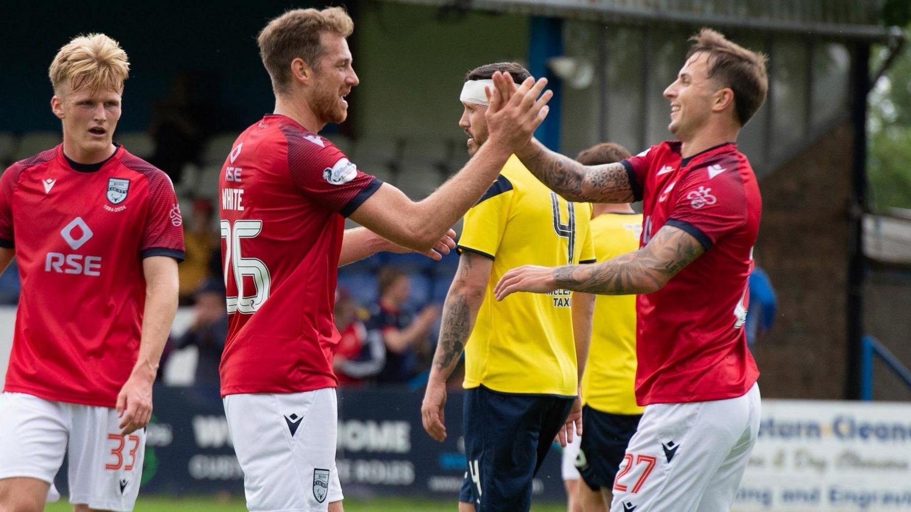 Ross County's Jordan White and Eamonn Brophy celebrate