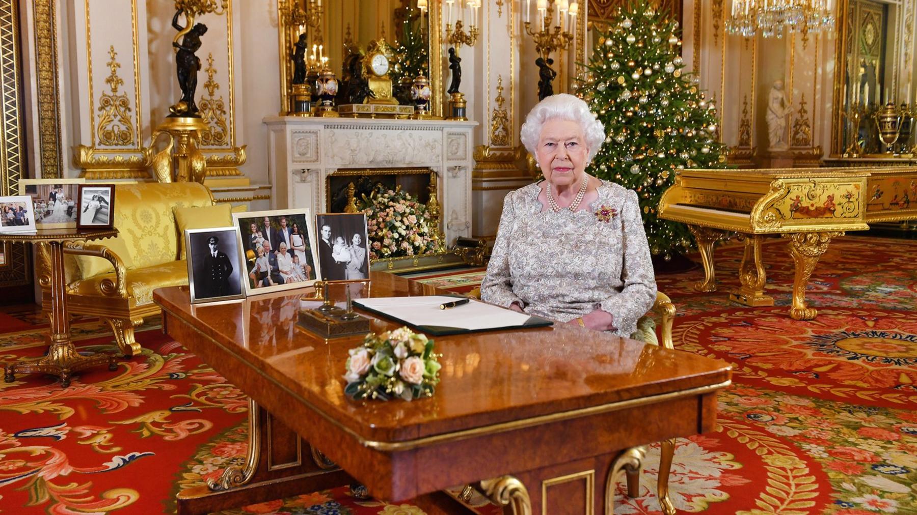 Queen Elizabeth II poses for a photo after she recorded her annual Christmas Day message, in the White Drawing Room at Buckingham Palace in a picture released on December 25, 2018