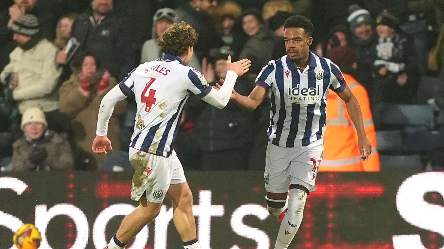 Grady Diangana celebrates his second-half equaliser with Albion team-mate Callum Styles