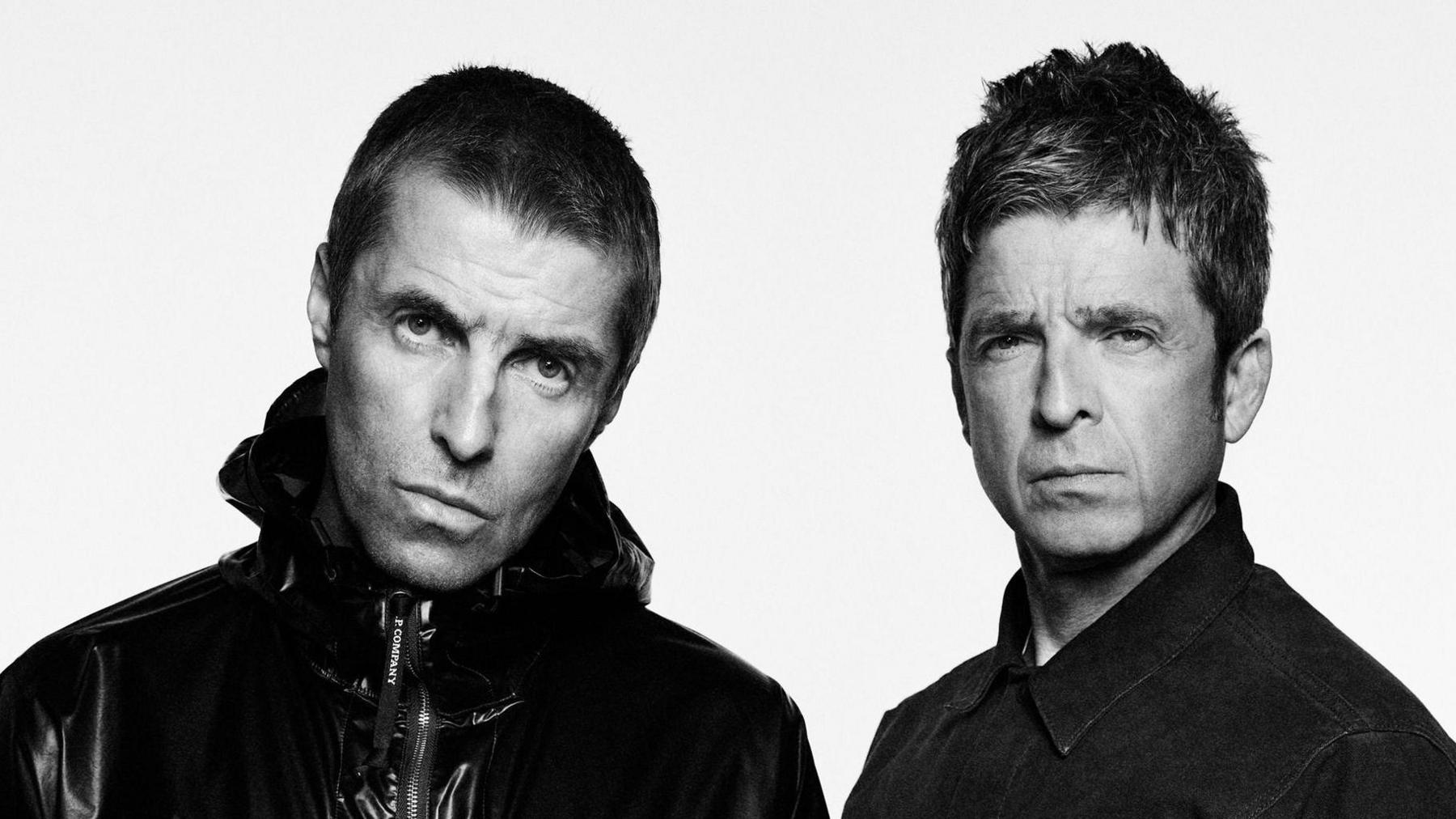 A black-and-white photo of Liam and Noel Gallagher 