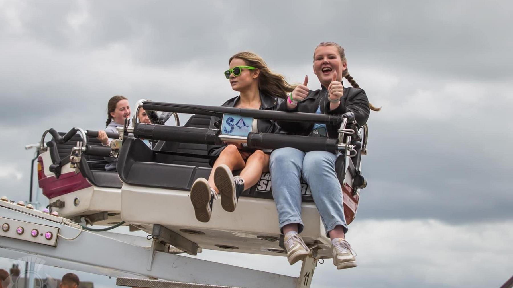 People on a fairground ride