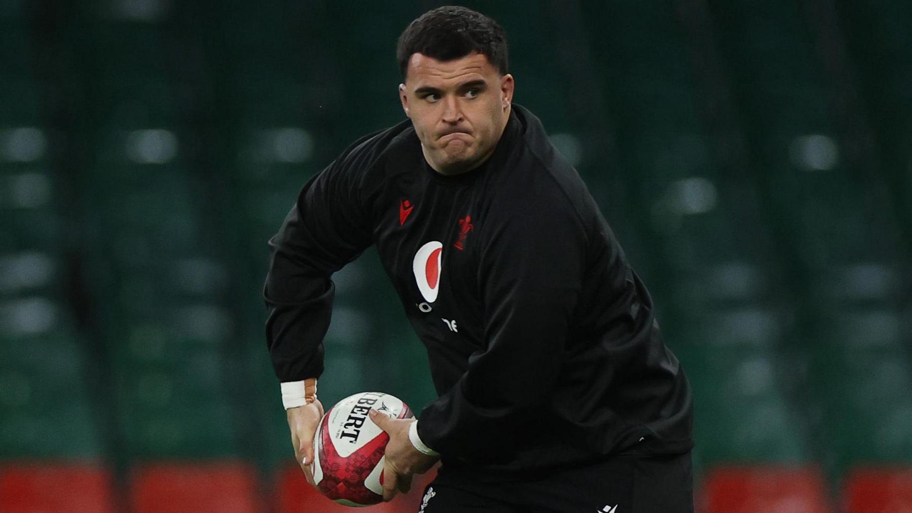 Chris Coleman warming up with Wales at Principality Stadium