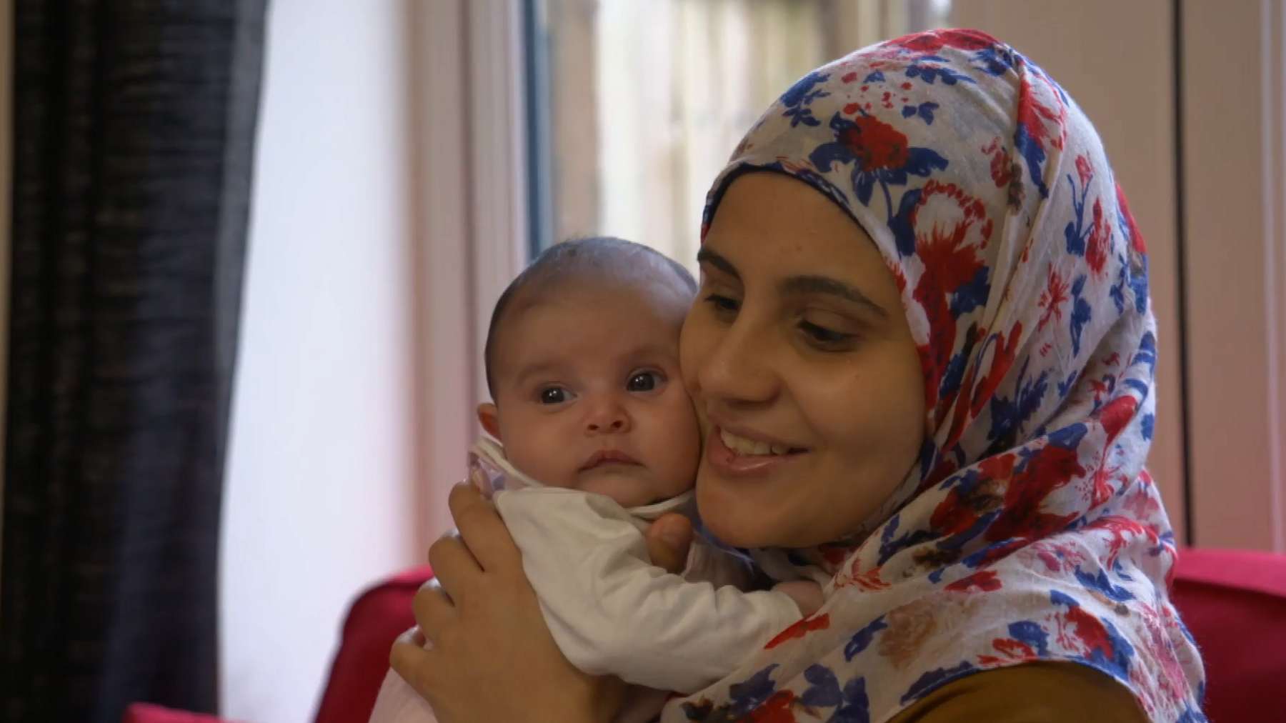 woman holding baby