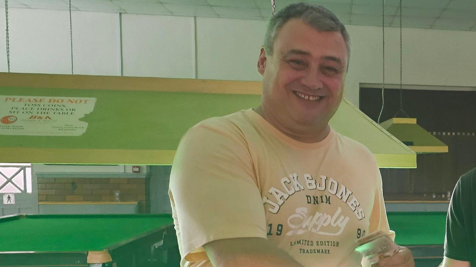 Club member Mark Freeman at a snooker fundraising event
