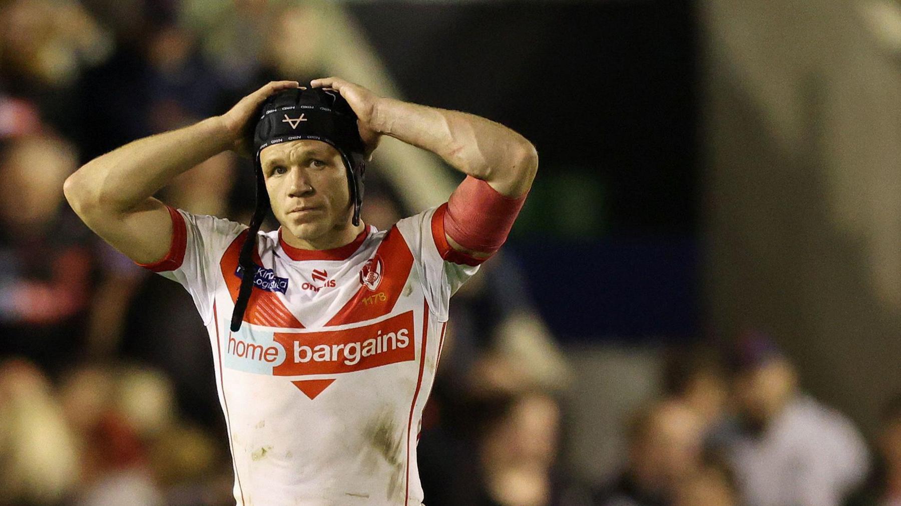 St Helens' Jonny Lomax looks wistful after their late defeat by Warrington