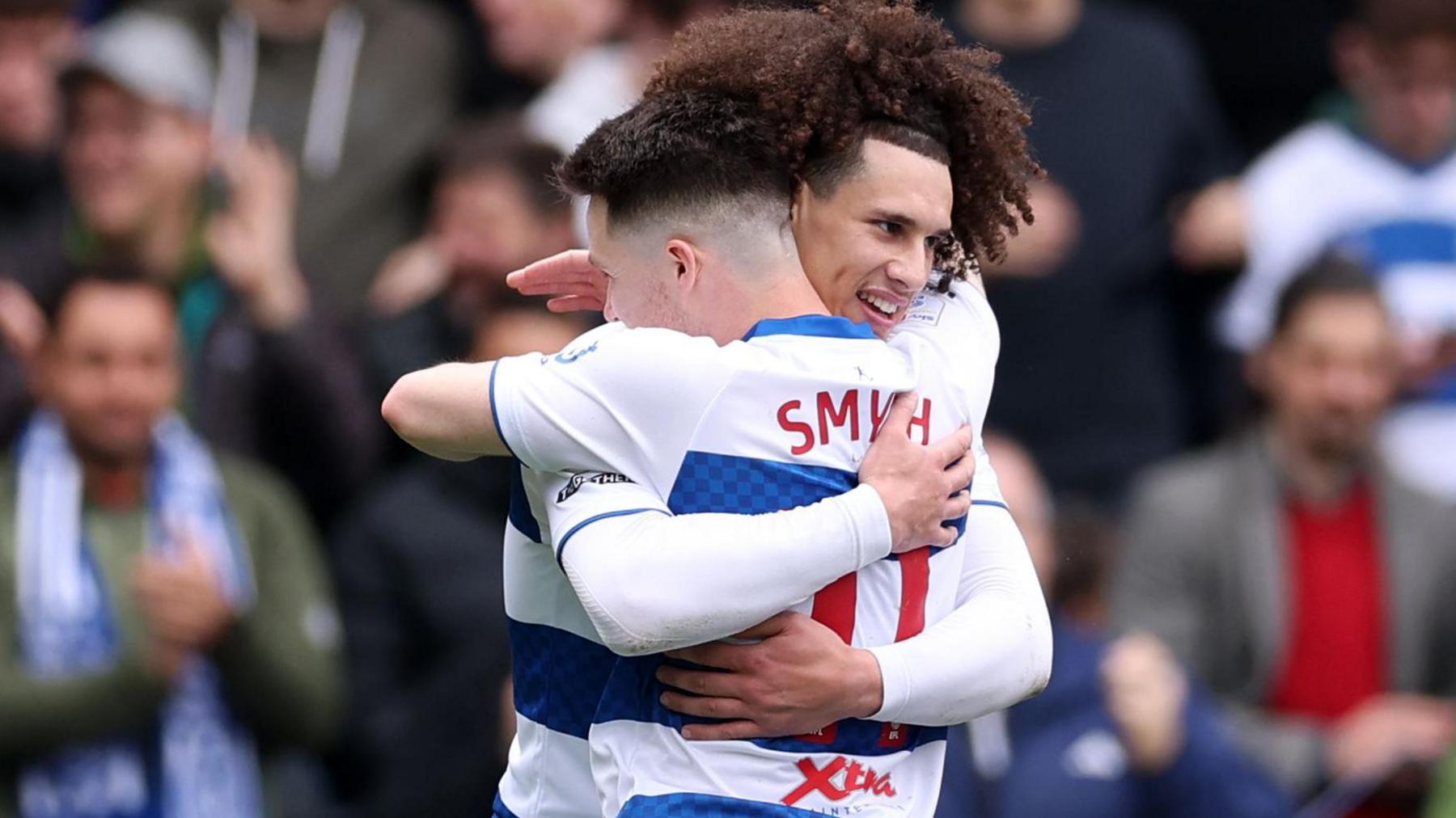 Paul Smyth congratulates QPR team-mate Rahan Kolli for scoring his fifth goal of the season