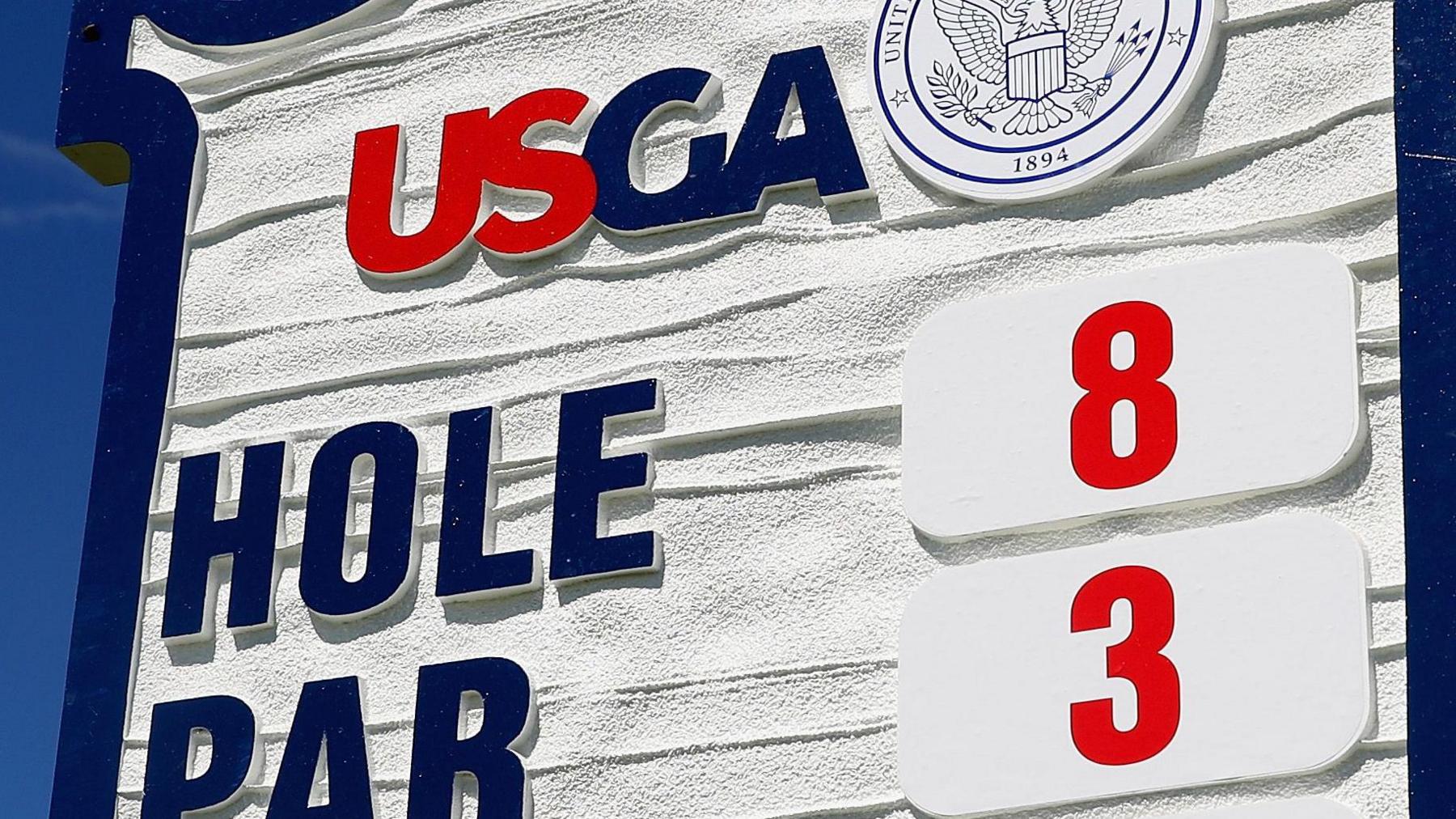 A board at Oakmont Country Club showing hole eight and par three