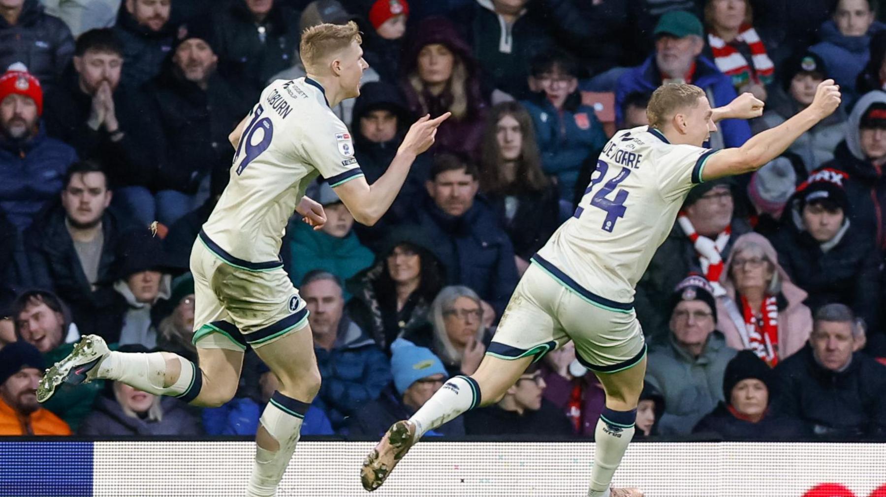 Millwall's Josh Coburn celebrates scoring their side's second goal during their win at Wrexham
