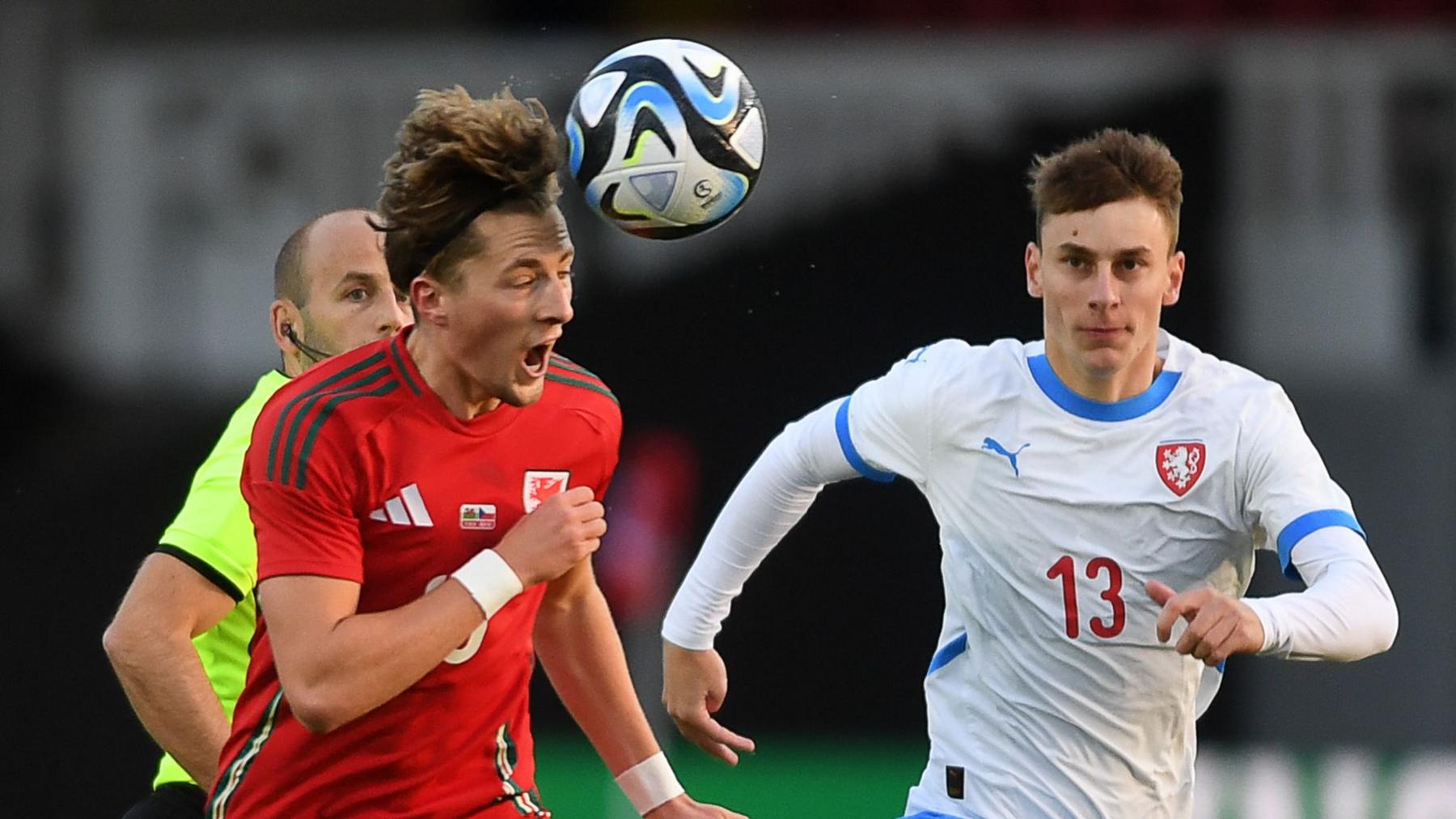 Wales' Charlie Savage launches an attack against the Czechs