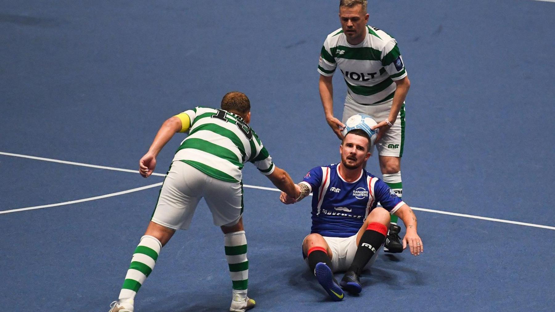 Celtic's Stiliyan Petrov and Simon Donnelly and Rangers' Barry Ferguson