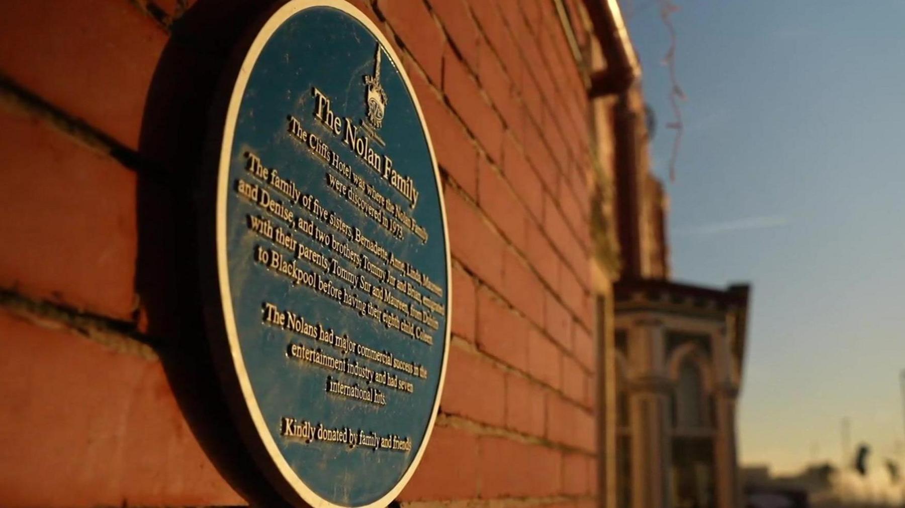 The blue plaque commemorating the band at Blackpool Cliffs Hotel