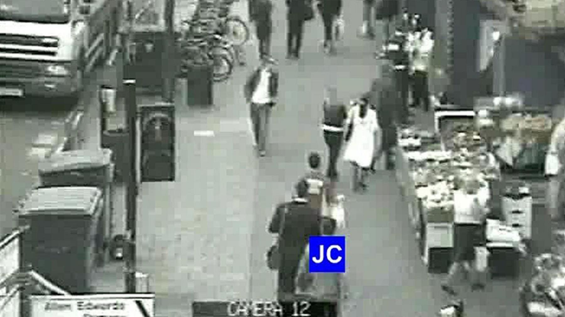 CCTV footage shows the last minutes of Jean Charles de Menezes life as he walks along the street with other pedestrians outside Stockwell underground station.