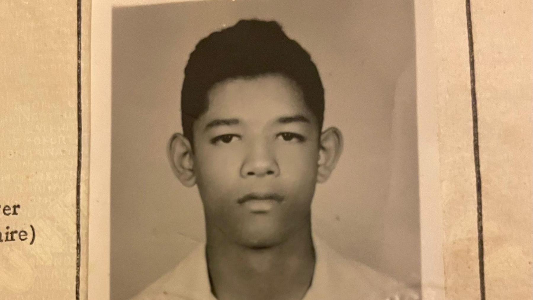 Mr Francis' passport photo at the time he arrived in the UK from Trinidad