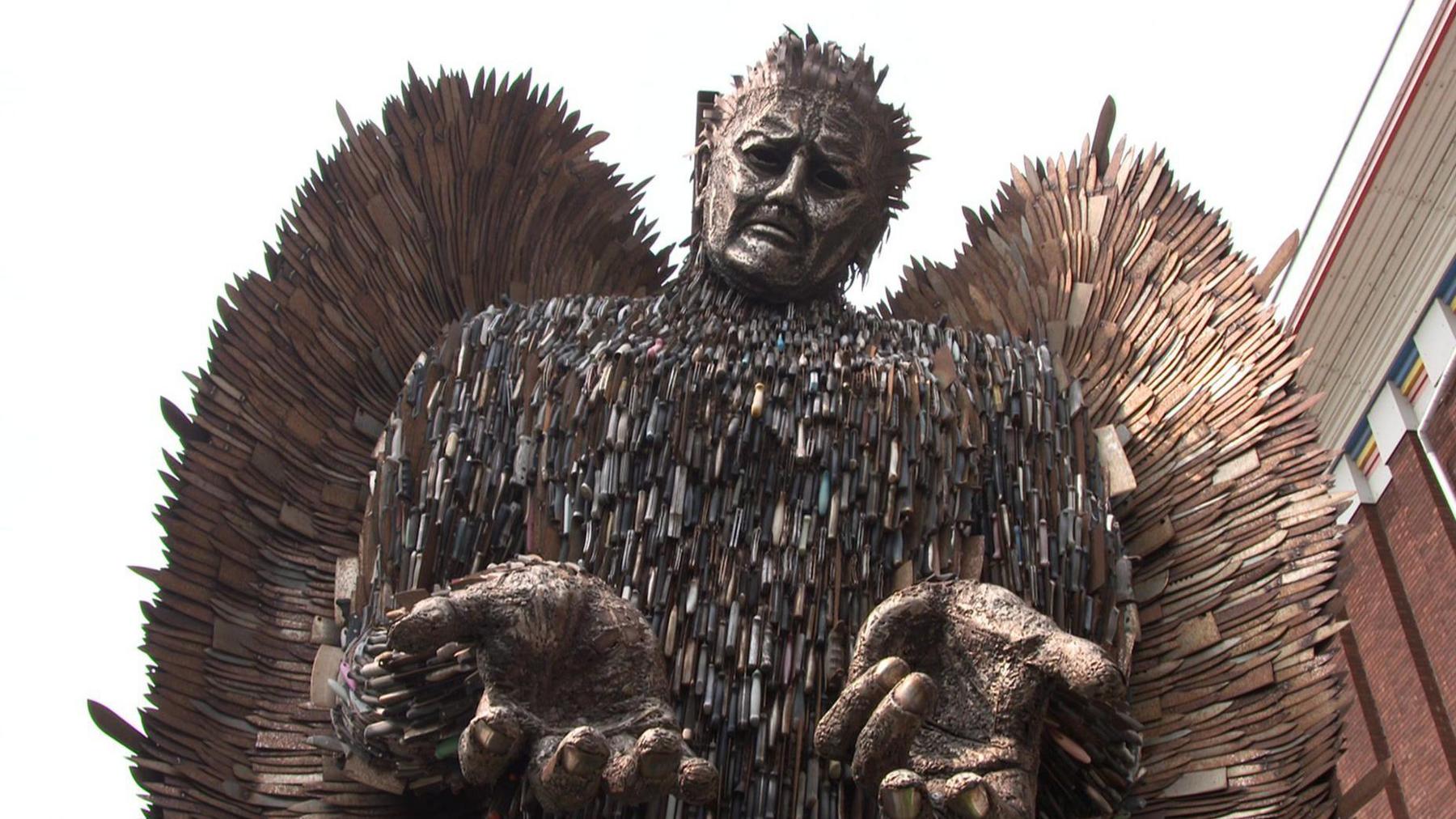 The knife angel. A 27ft-tall (8m) metal sculpture in the shape of an angel with its hands held out, made from 100,000 blades.