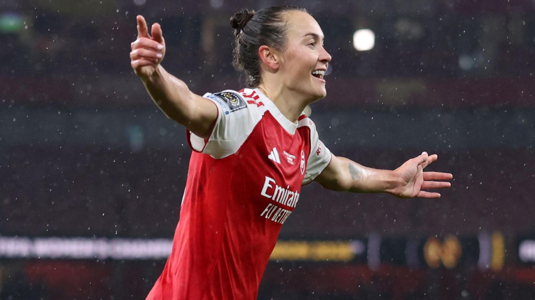 Caitlin Foord of Arsenal celebrates scoring their third goal 