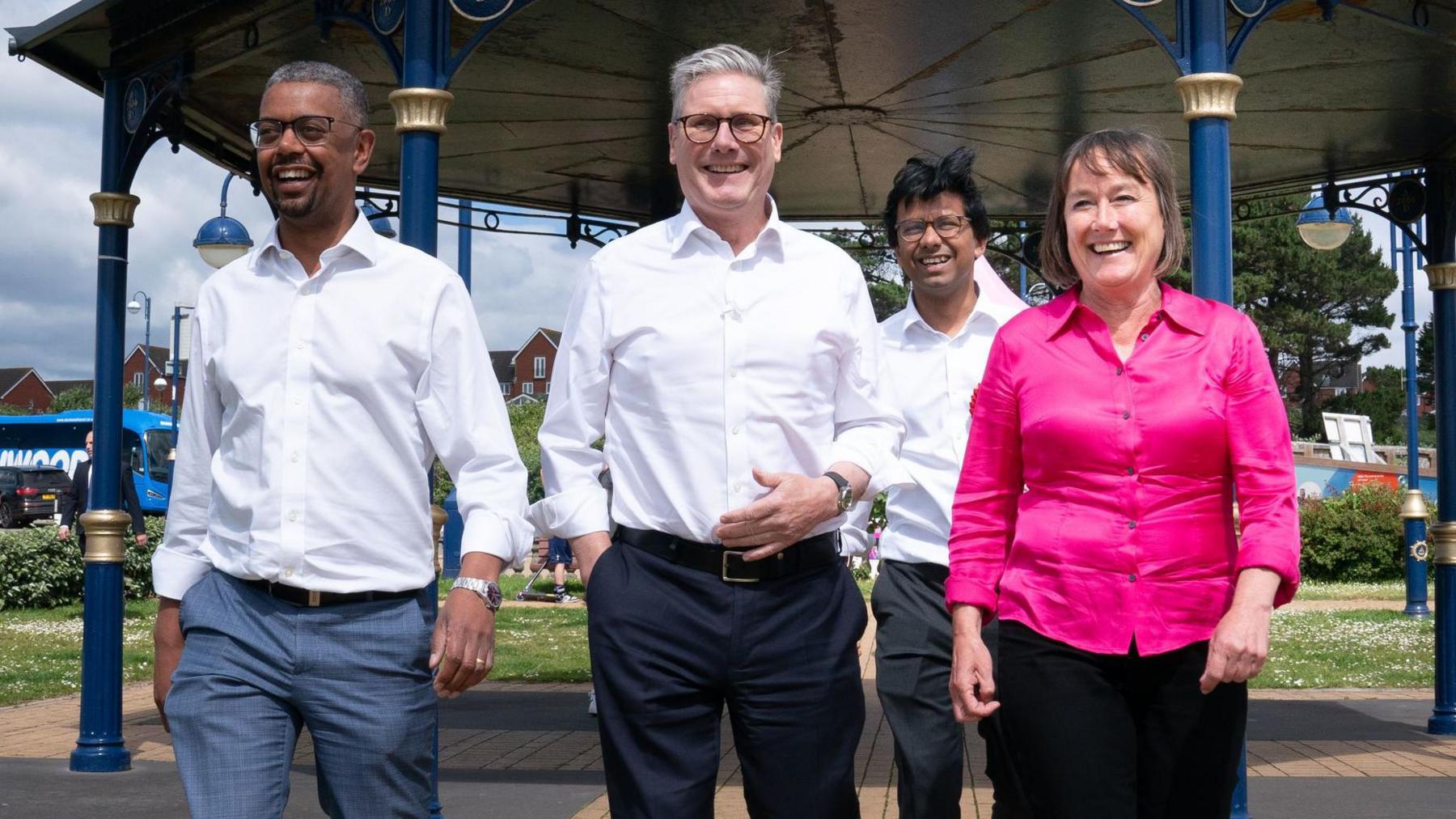 Labour leader Sir Keir Starmer, Vale of Glamorgan candidate Kanisha Narayan, First Minister of Wales Vaughan Gething and shadow Welsh Secretary Jo Stevens walking on Barry seafront