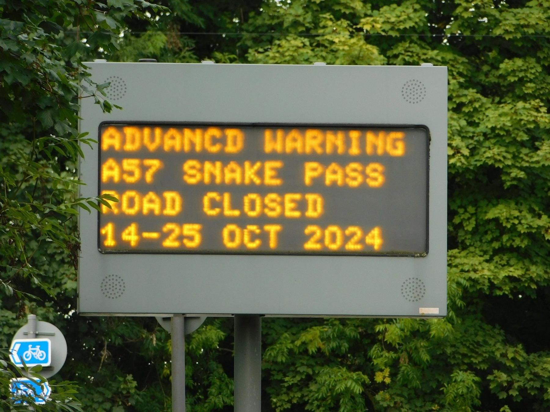 A sign warning drivers of a closure in October