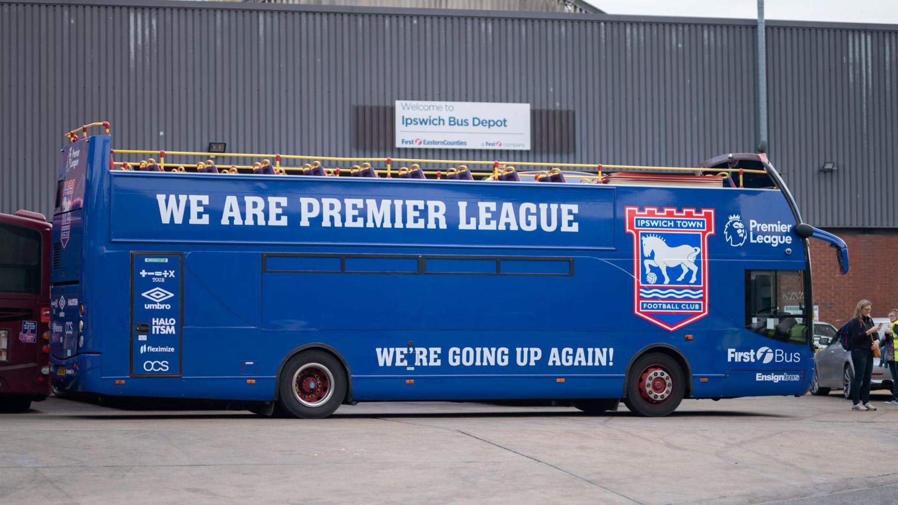 The decorated bus before the parade