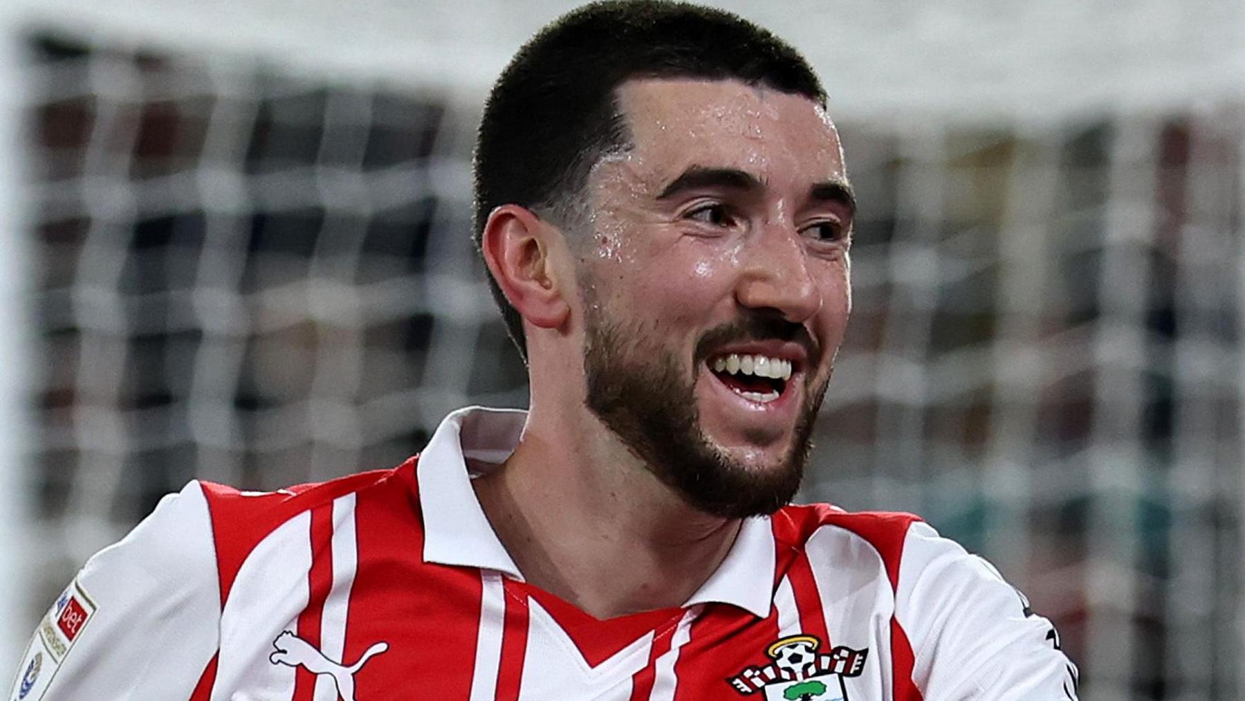 Finn Azaz has a broad smile on his face after scoring against Norwich City