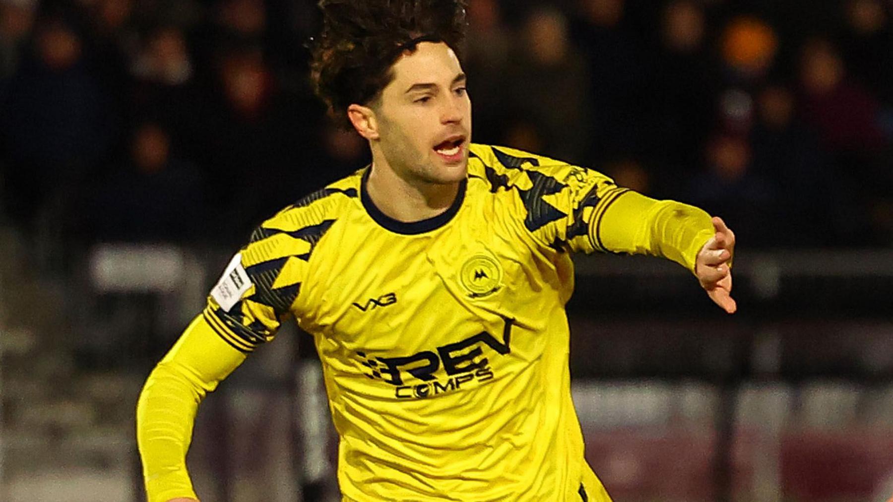 Jordan Young celebrates scoring for Torquay United