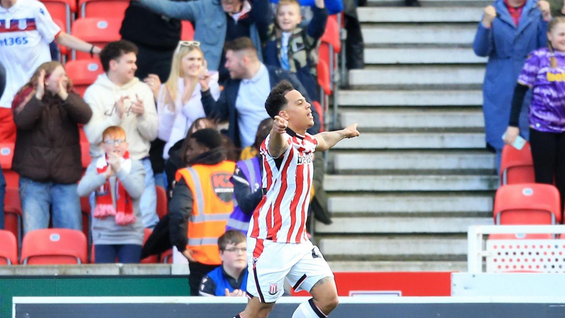 Million Manhoef celebrating after scoring his first of two goals