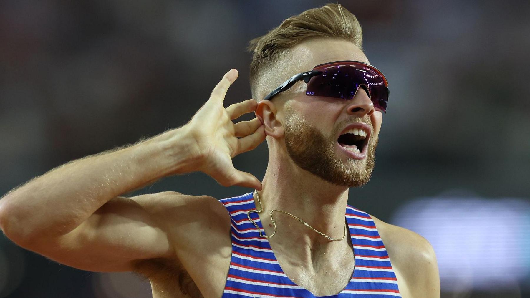 Great Britain's Josh Kerr celebrates winning World Championship 1500m gold in 2023