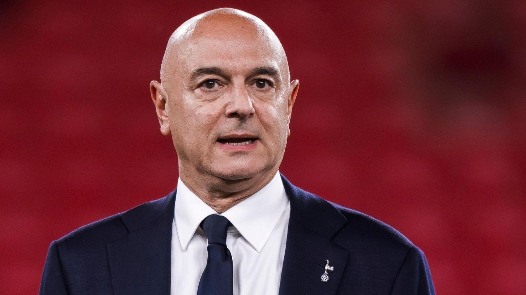 Daniel Levy in shirt and jacket with a Tottenham lapel badge