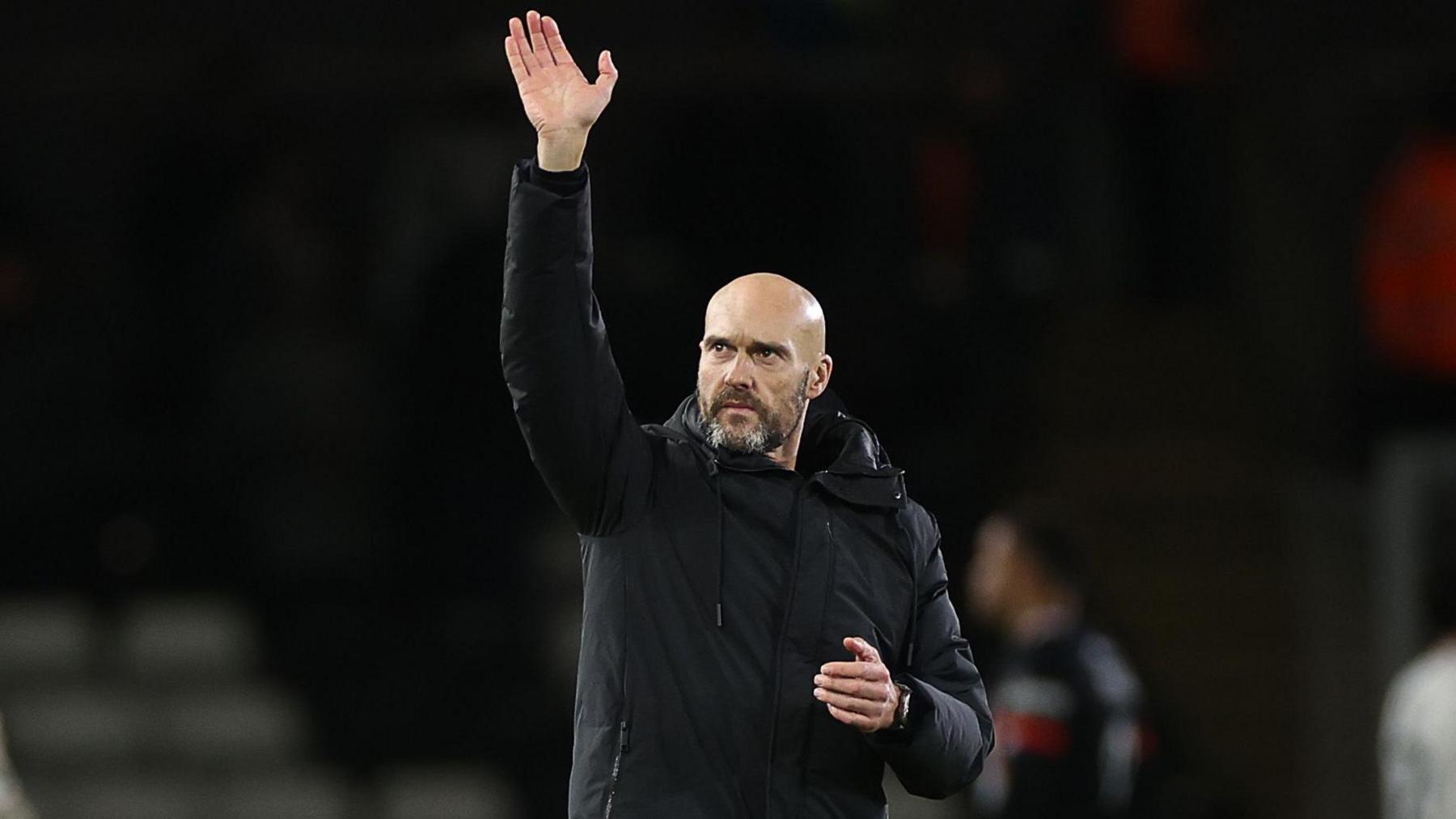 Luke Williams waves to fans after victory over Luton Town