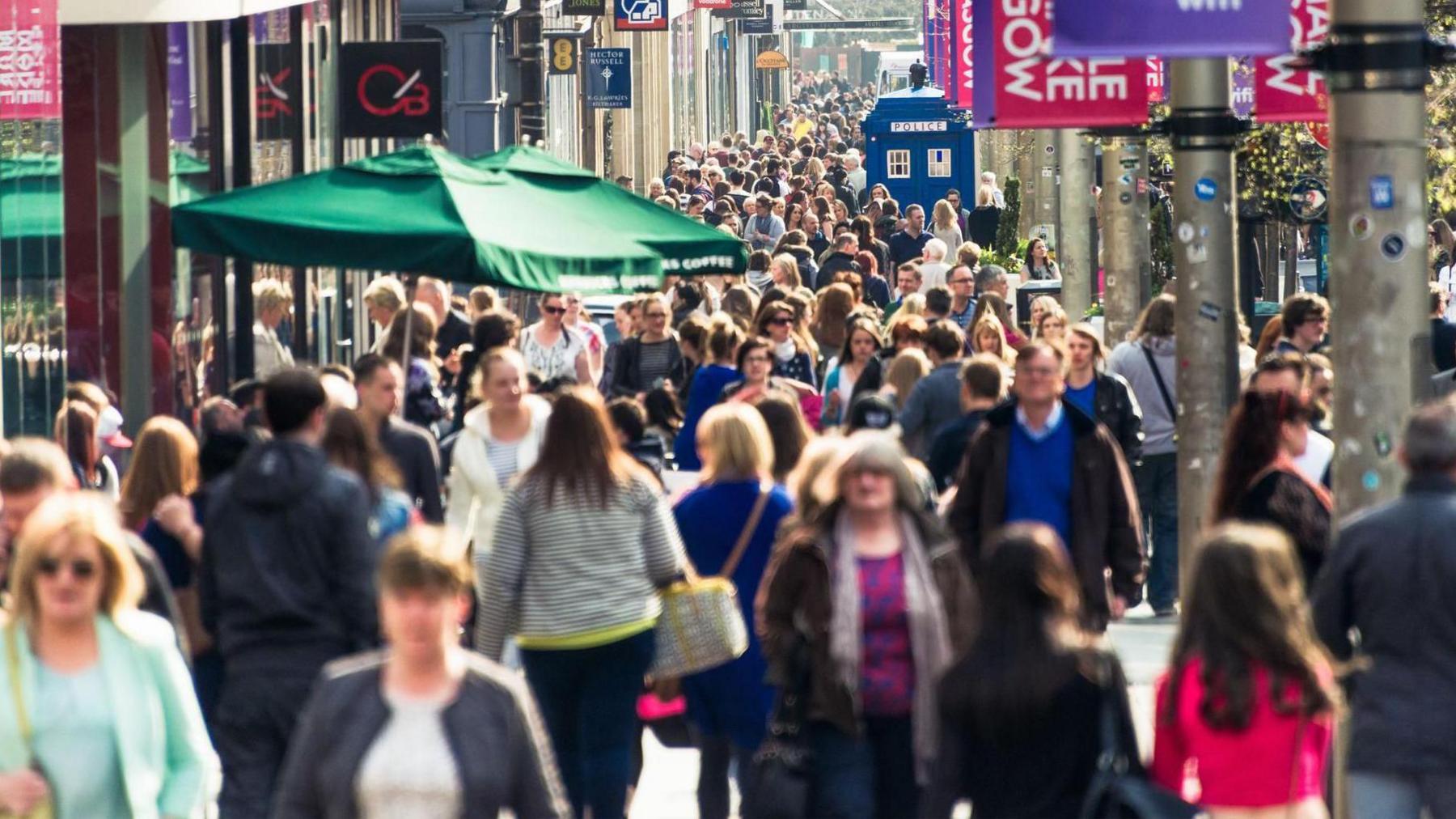 A crowded street of people