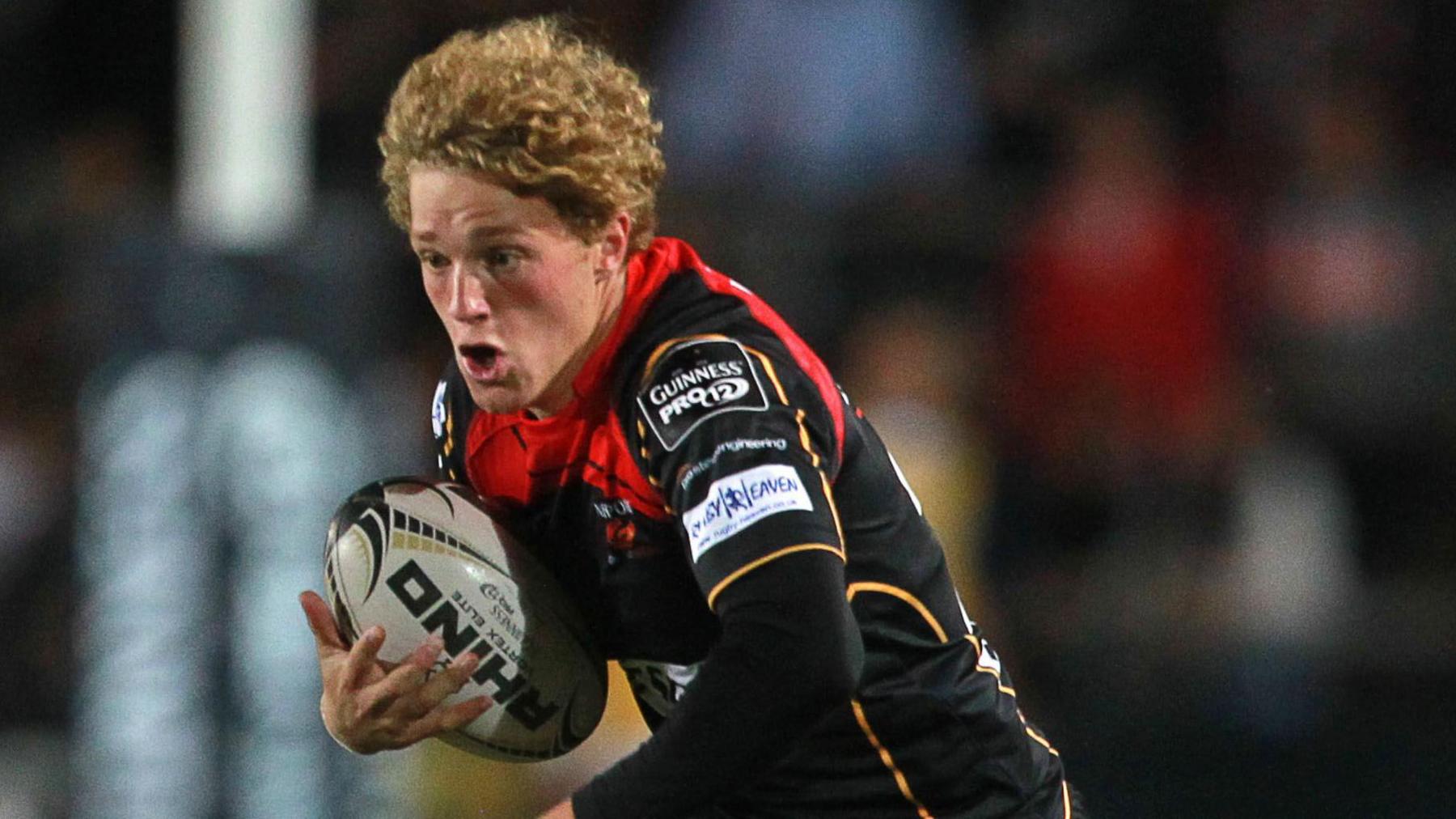 Angus O'Brien runs with the ball for Dragons in 2014