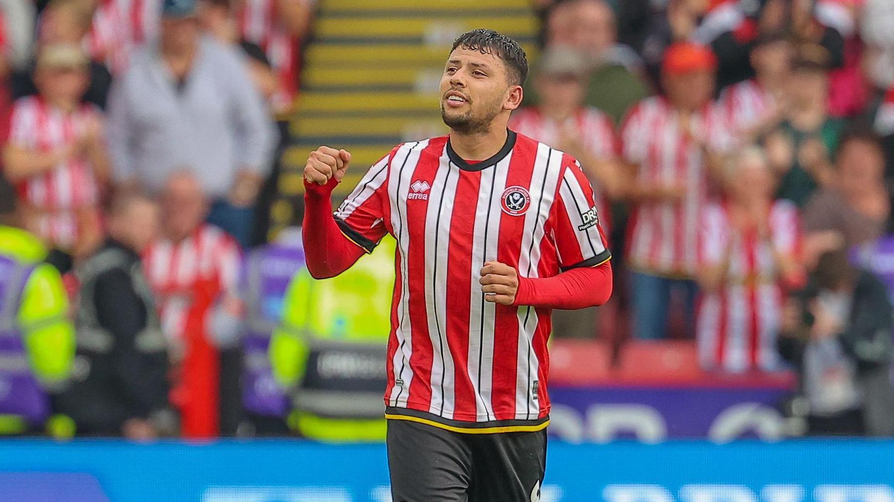 Gustavo Hamer celebrates scoring for Sheffield United against Derby County in the 2024-25 Championship season.