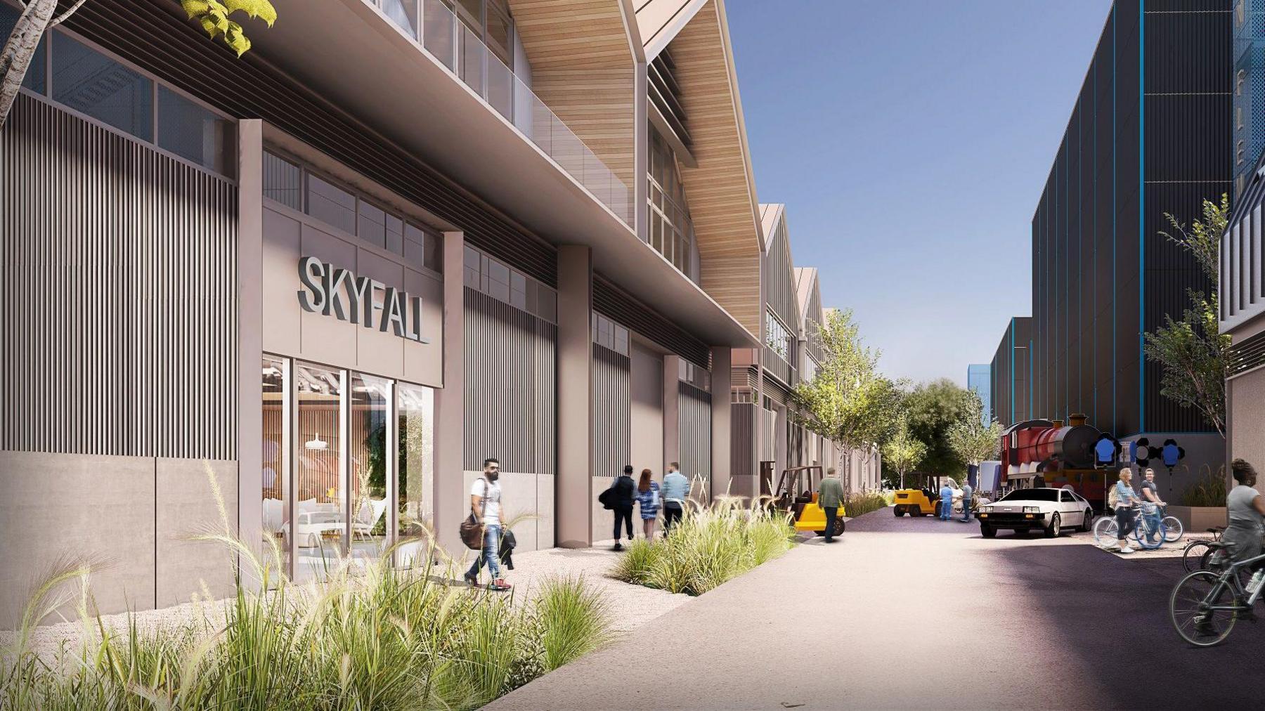 An artist's impression of what part of the studio backlot could look like. A building labelled Skyfall is one of several workshops with people walking between