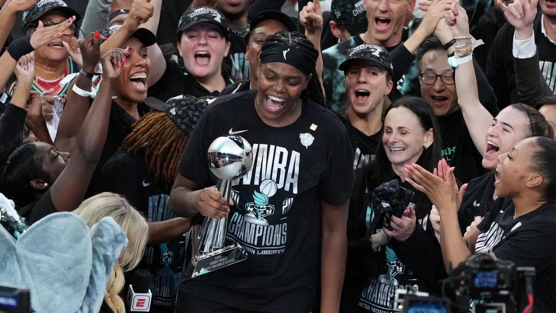 Jonquel Jones celebrates New York Liberty winning the WNBA title 