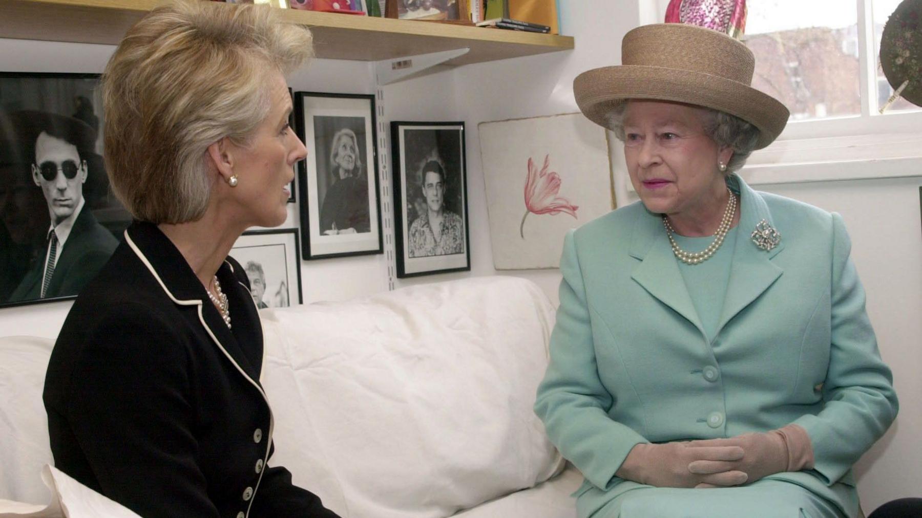 File photo dated 22/03/01 of Queen Elizabeth II (right) meeting Joanna Trollope at Bloomsbury Publishing in London.